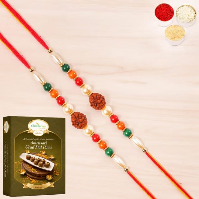 Ghasitaram Gifts Rakhi for Brother Rakhis Online - Set of 2-6106 Rudraksh Rakhiwith 200 gms of Pinni