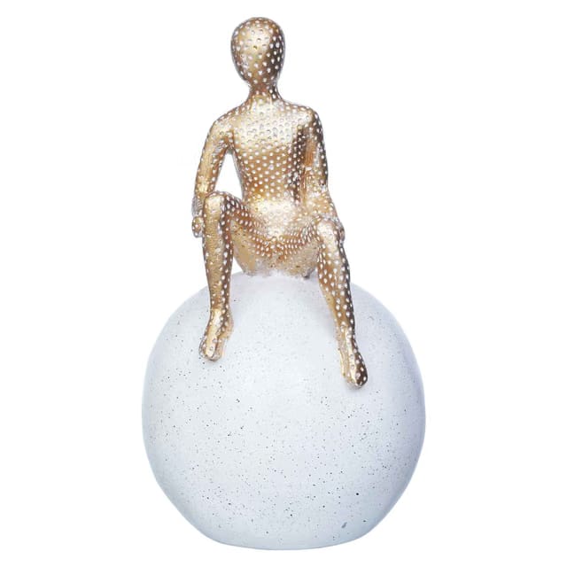 Golden Boy Statue Sitting on White Ball Human Figurine