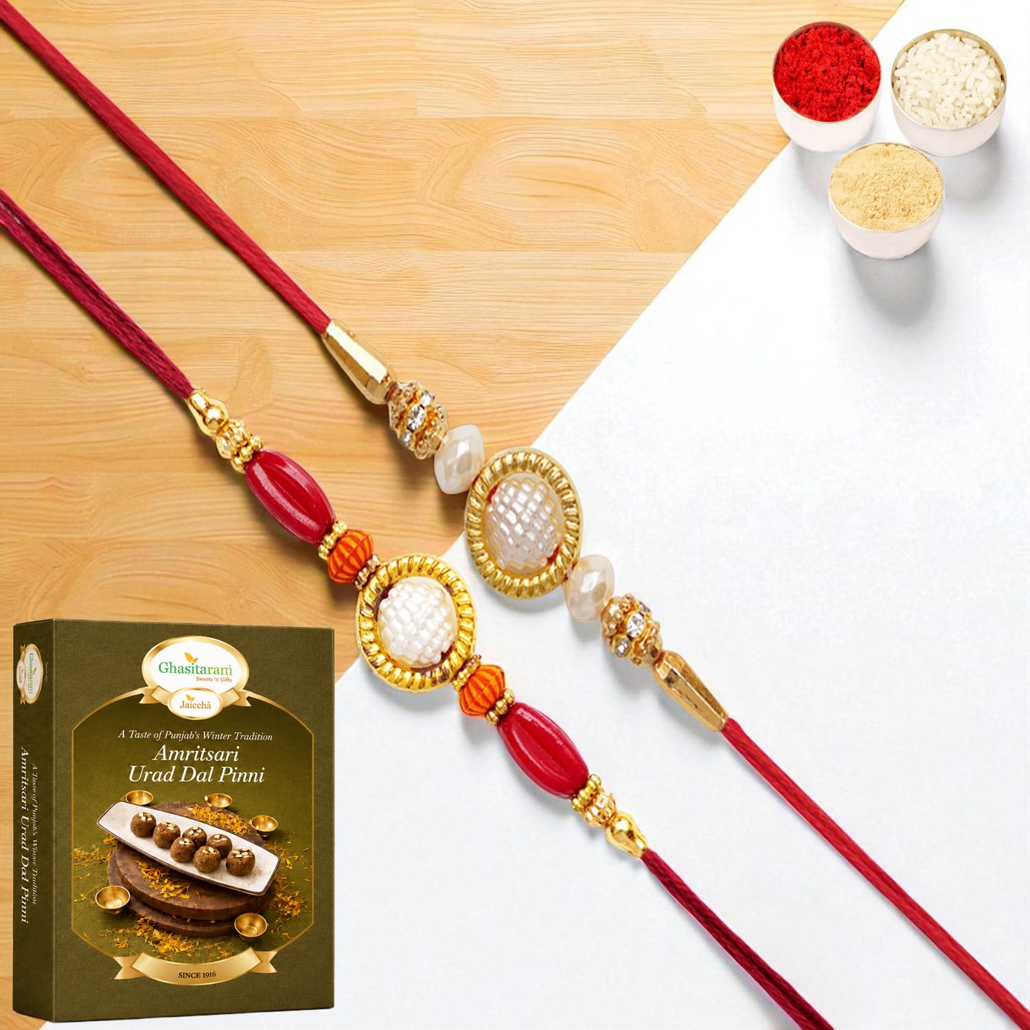 Ghasitaram Gifts Jaiccha Set of 2 y84 and abc 147 pearl ring rakhis with 200 gms of Pinni