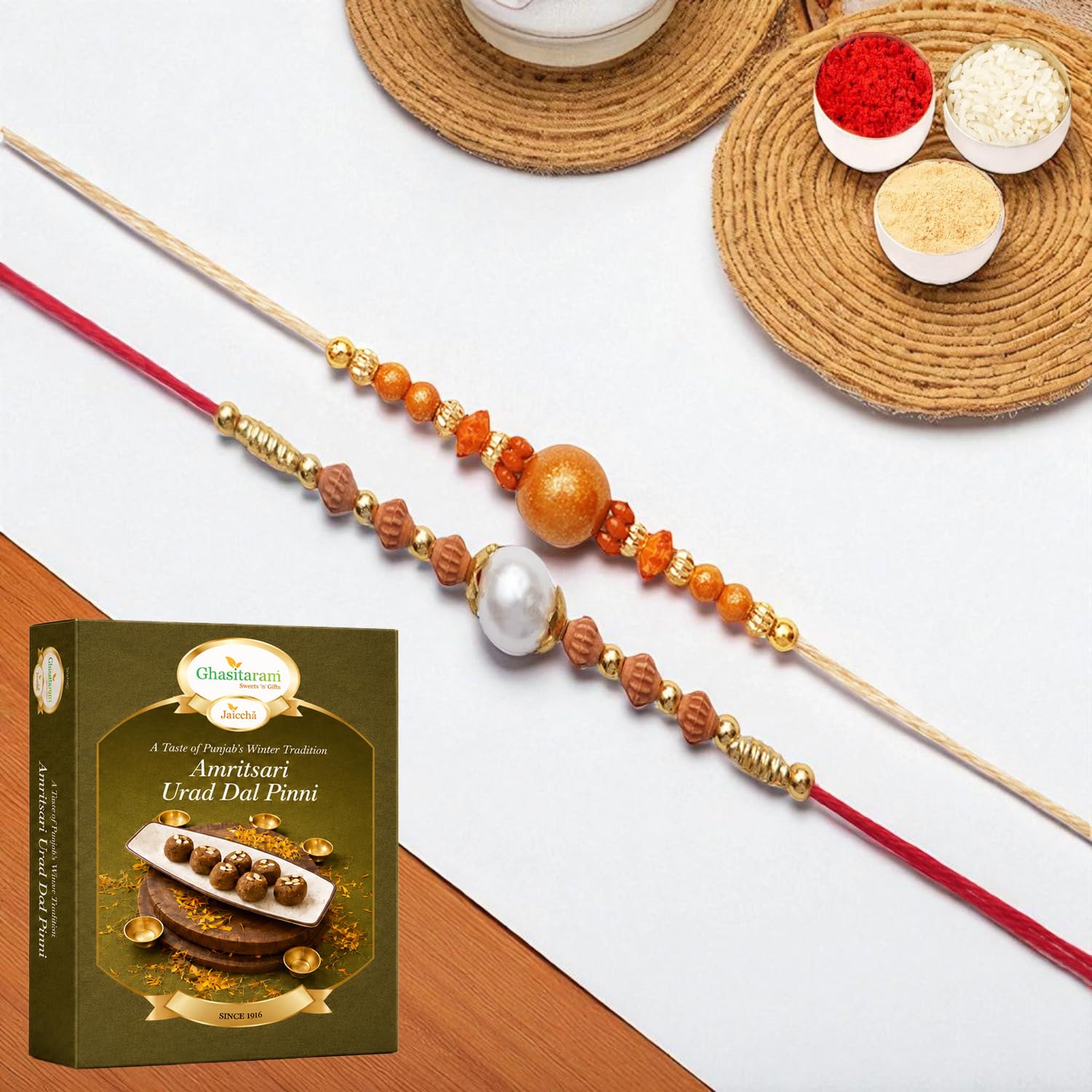 Ghasitaram Gifts Jaiccha Set of 2 abc119 and abc 106 pearl rakhis with 200 gms of Pinni